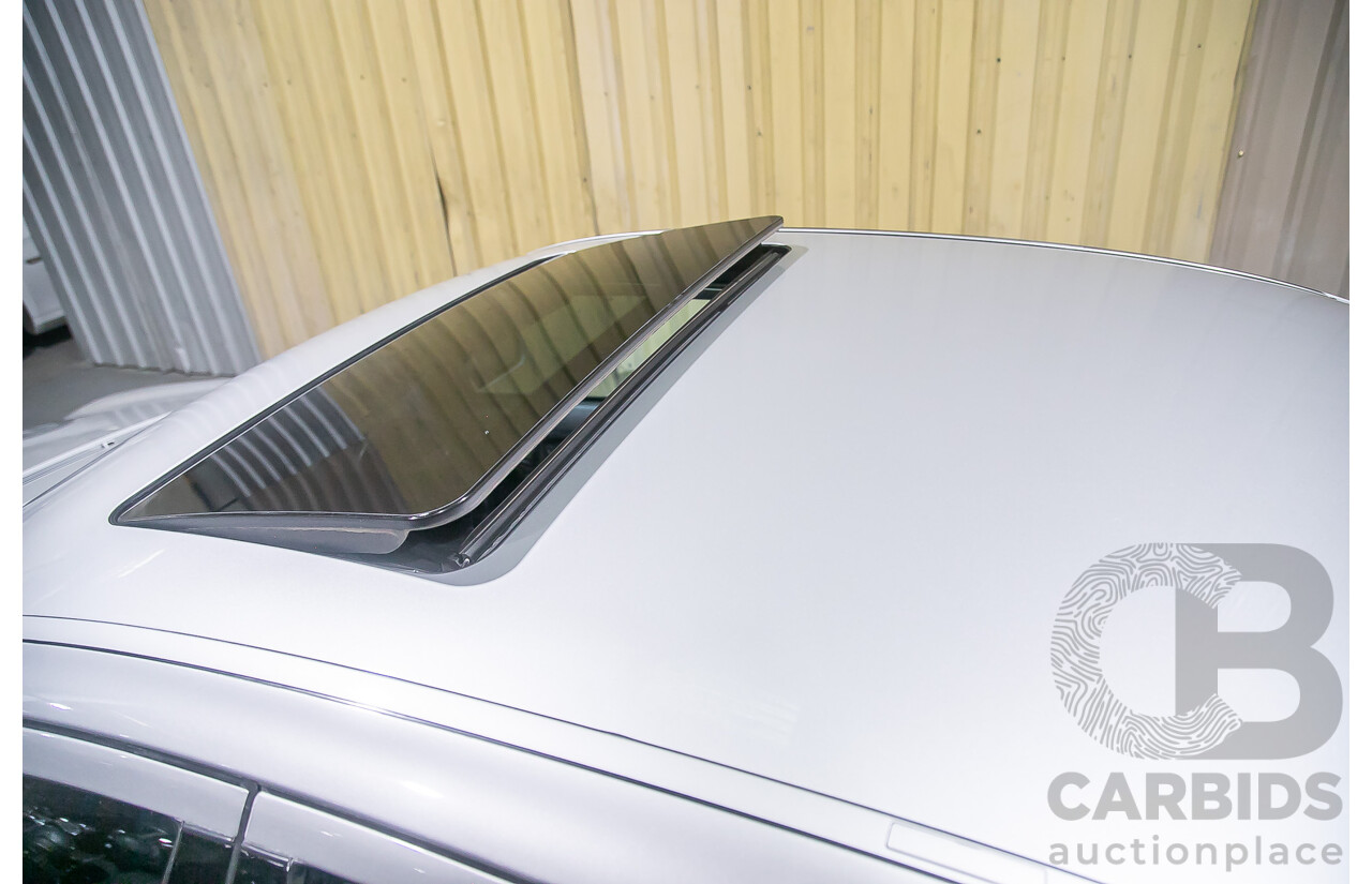 10/2004 Mercedes Benz E55 AMG W211 4d Sedan Brilliant Silver Metallic Supercharged V8 5.4L