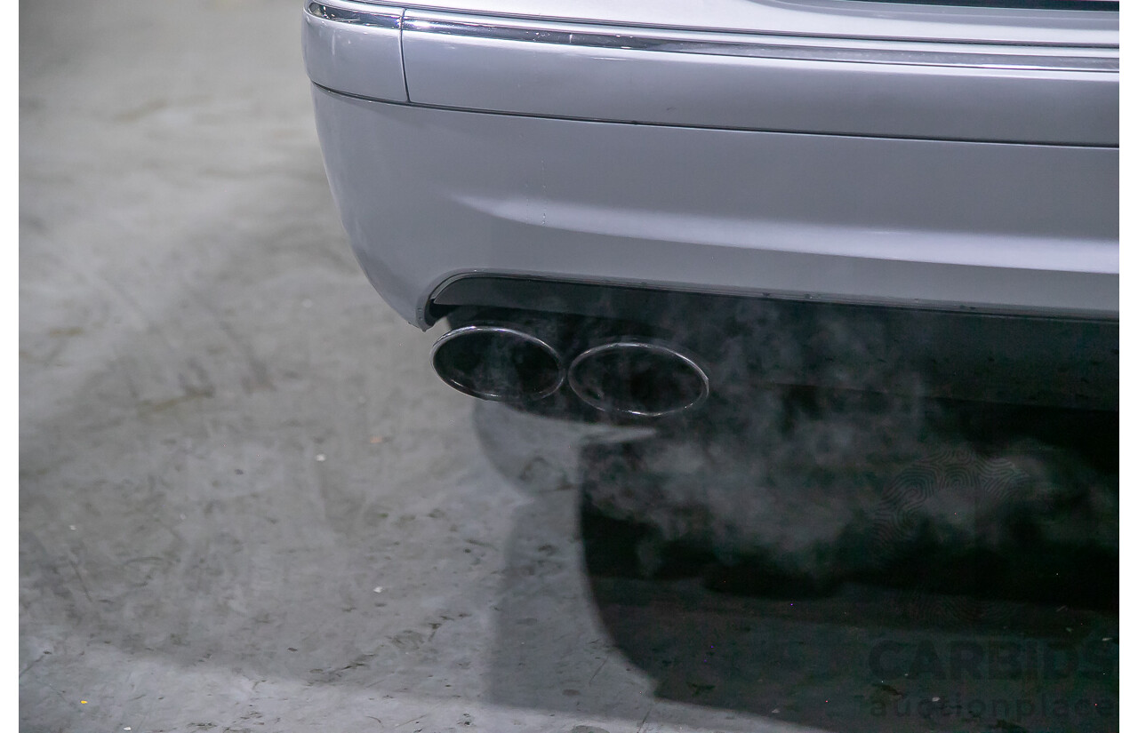 10/2004 Mercedes Benz E55 AMG W211 4d Sedan Brilliant Silver Metallic Supercharged V8 5.4L