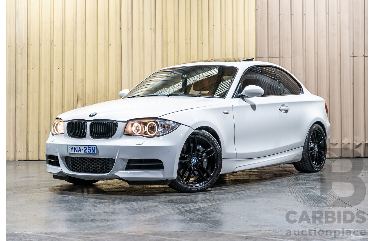 8/2009 BMW 135i Sport E82 MY09 2d Coupe White Turbo 3.0L
