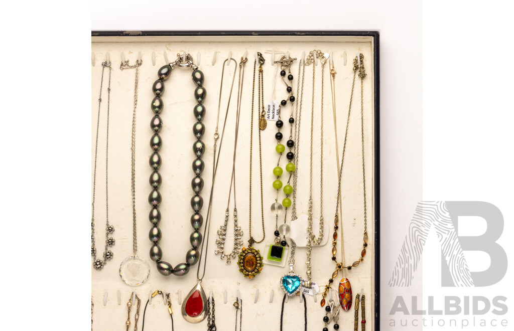 Collection of (32) Vintage Necklaces in Various Designs on Display Mount