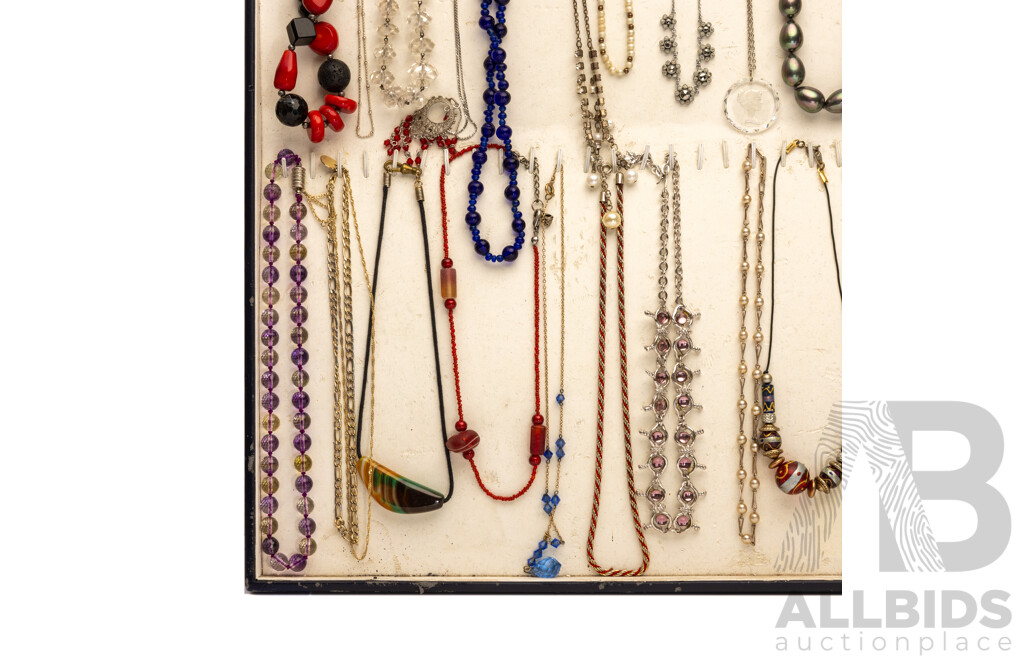 Collection of (32) Vintage Necklaces in Various Designs on Display Mount