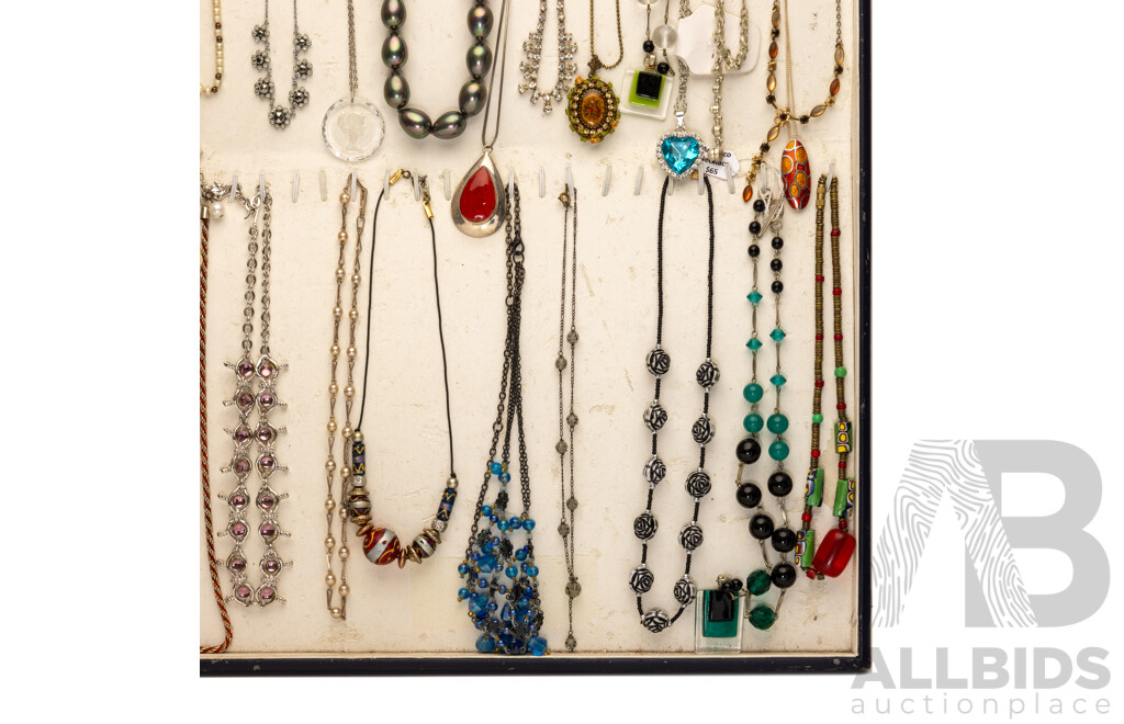 Collection of (32) Vintage Necklaces in Various Designs on Display Mount