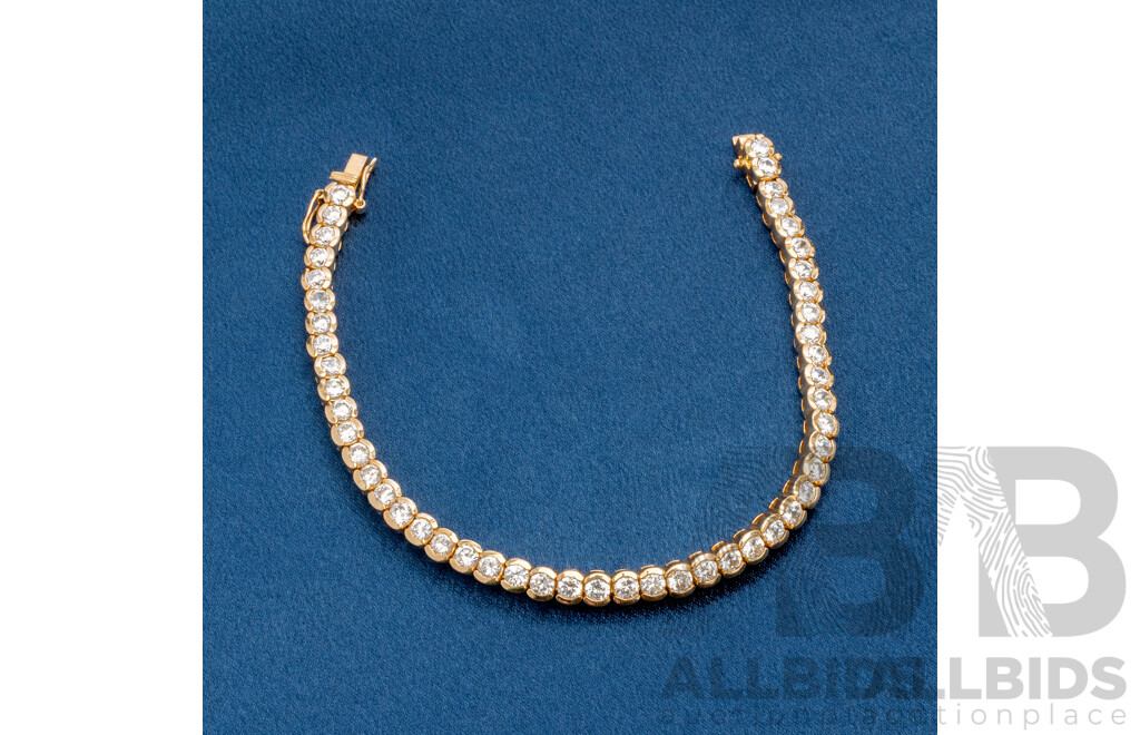 925 Sterling Silver Gold Plated Tennis Bracelet With Cubic Zirconias. Length - 19.5cms