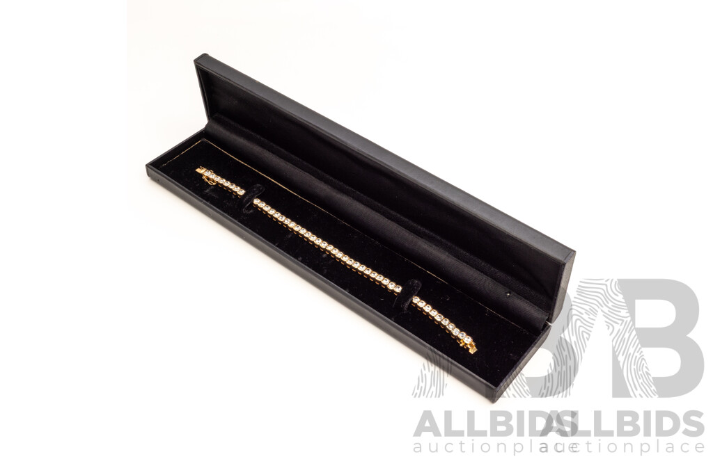 925 Sterling Silver Gold Plated Tennis Bracelet With Cubic Zirconias. Length - 19.5cms