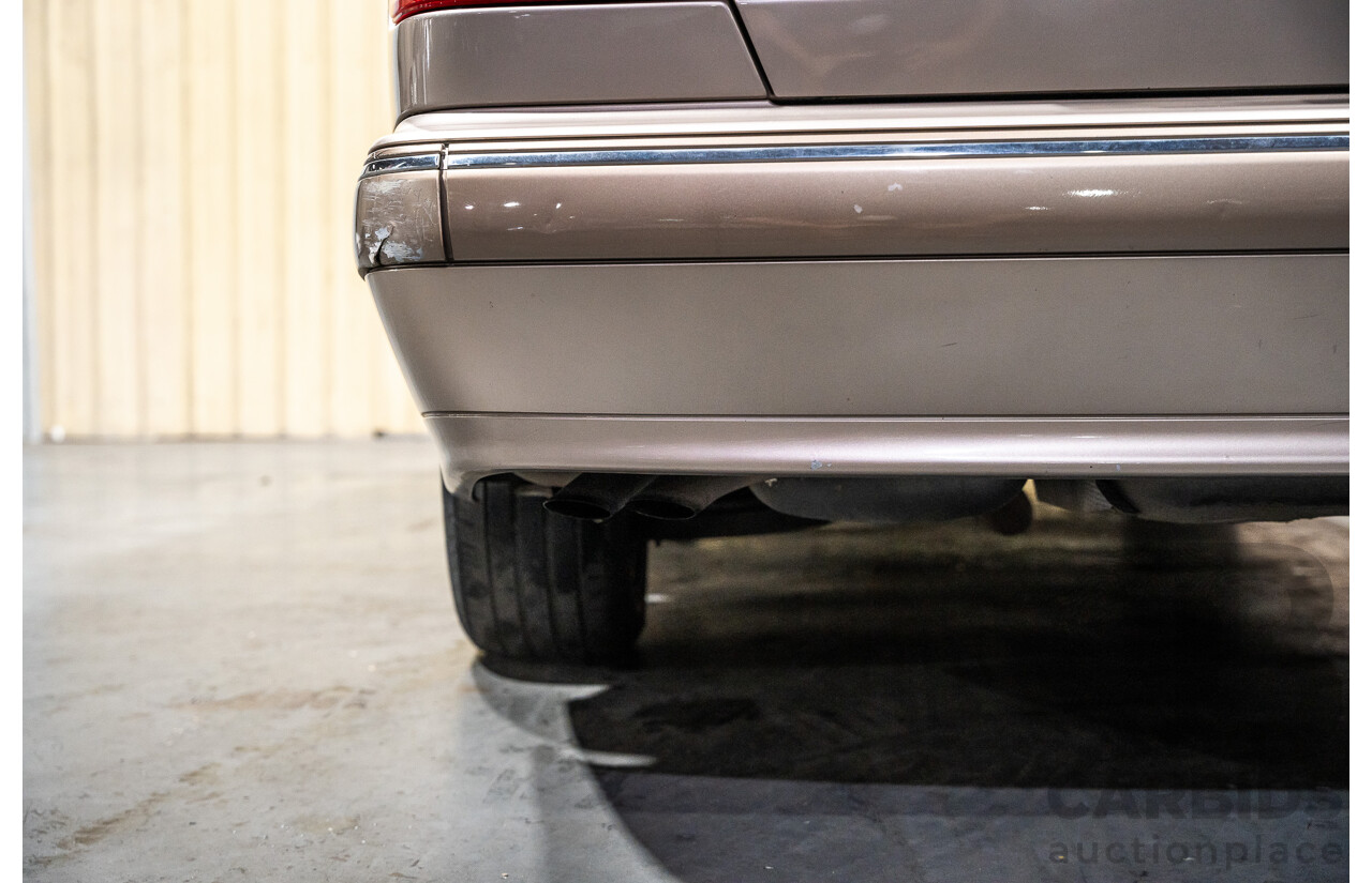 11/1999 Mercedes-Benz E240 Elegance W210 4d Sedan Travertine Beige Metallic 2.4L