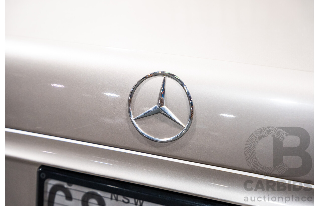 11/1999 Mercedes-Benz E240 Elegance W210 4d Sedan Travertine Beige Metallic 2.4L