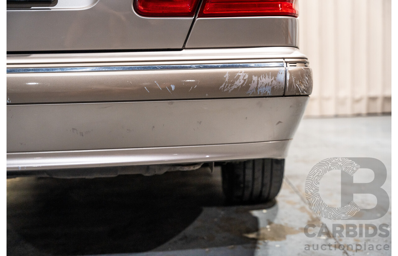 11/1999 Mercedes-Benz E240 Elegance W210 4d Sedan Travertine Beige Metallic 2.4L