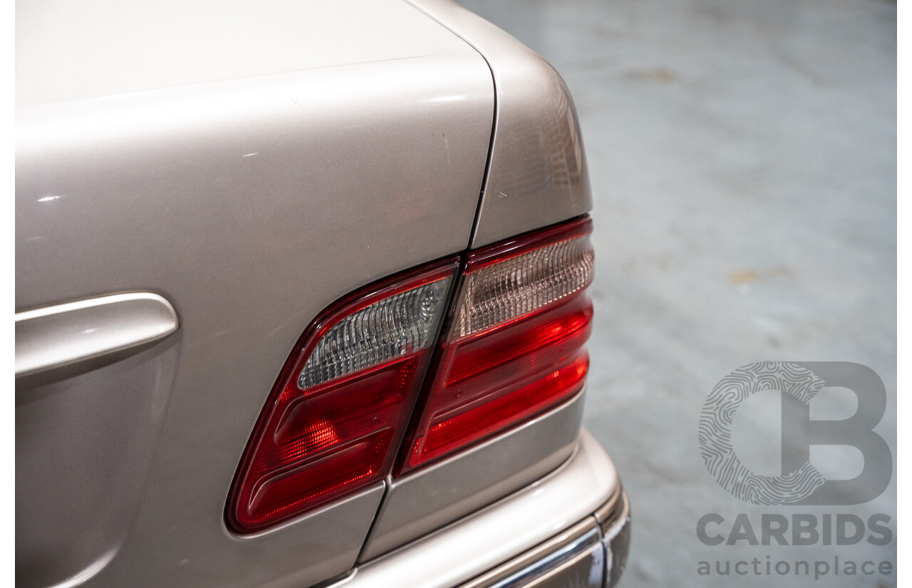 11/1999 Mercedes-Benz E240 Elegance W210 4d Sedan Travertine Beige Metallic 2.4L