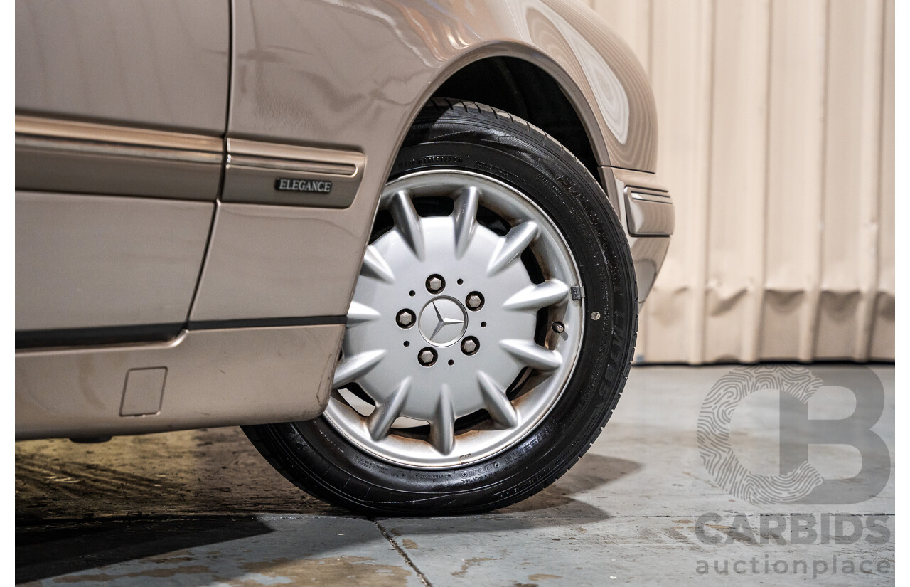 11/1999 Mercedes-Benz E240 Elegance W210 4d Sedan Travertine Beige Metallic 2.4L