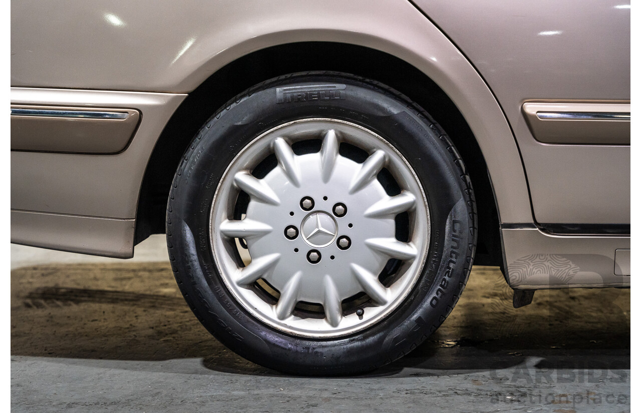 11/1999 Mercedes-Benz E240 Elegance W210 4d Sedan Travertine Beige Metallic 2.4L