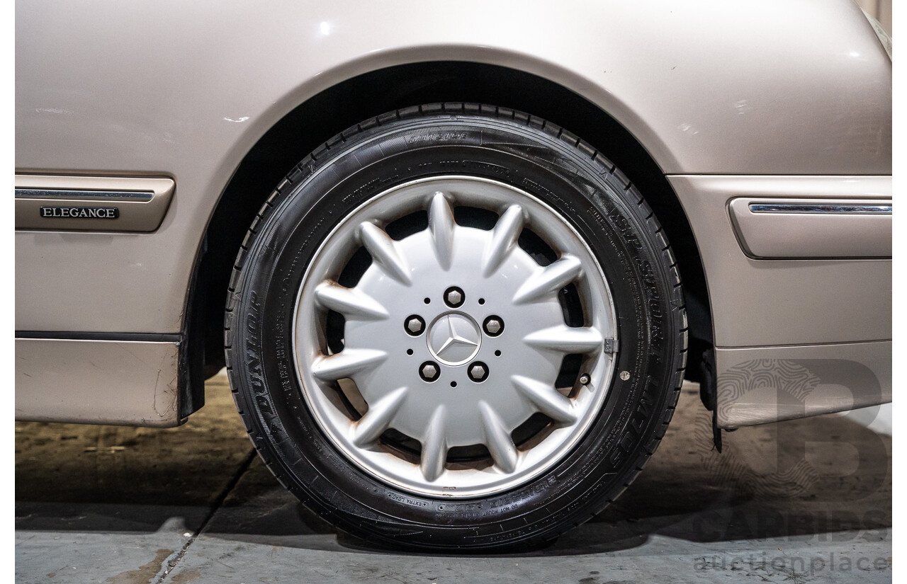 11/1999 Mercedes-Benz E240 Elegance W210 4d Sedan Travertine Beige Metallic 2.4L