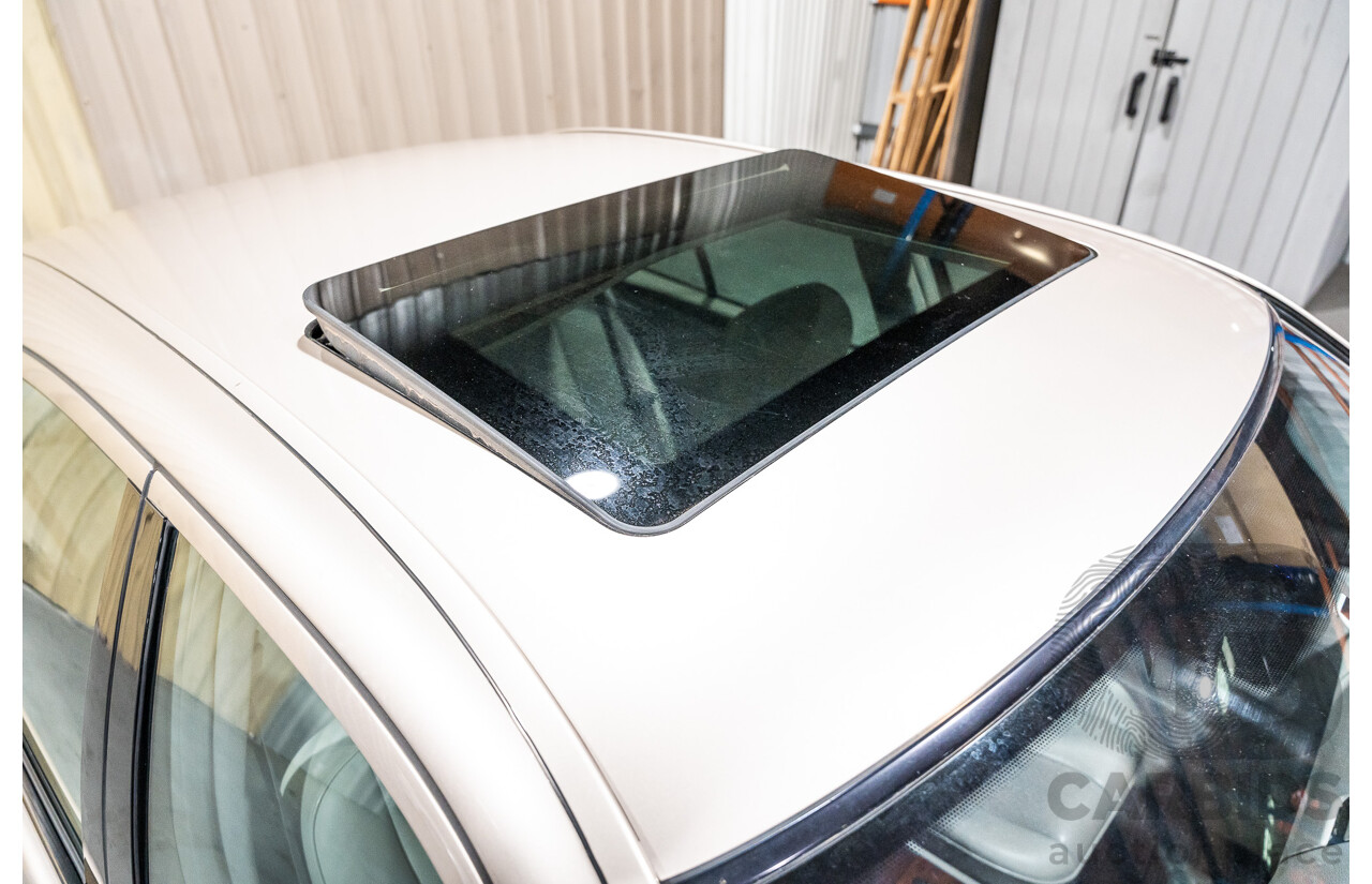 11/1999 Mercedes-Benz E240 Elegance W210 4d Sedan Travertine Beige Metallic 2.4L