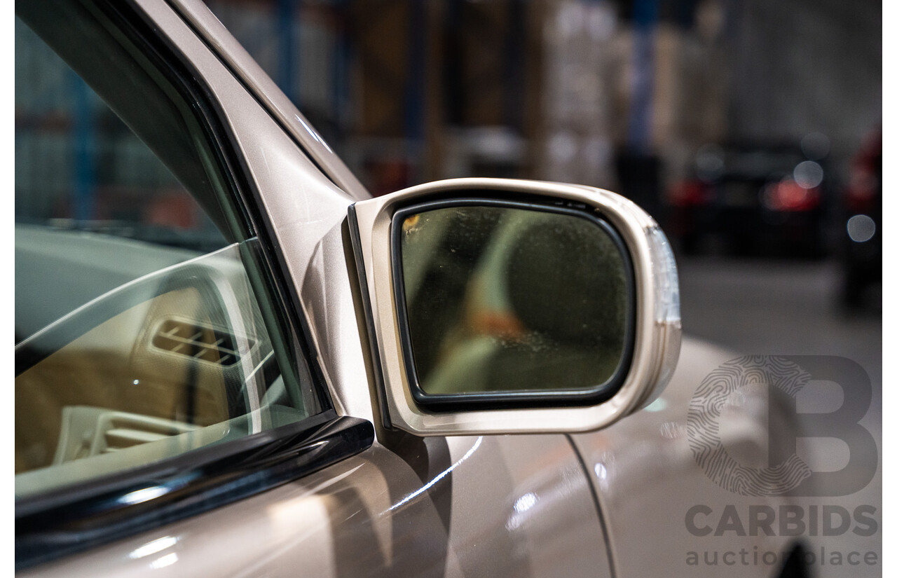 11/1999 Mercedes-Benz E240 Elegance W210 4d Sedan Travertine Beige Metallic 2.4L