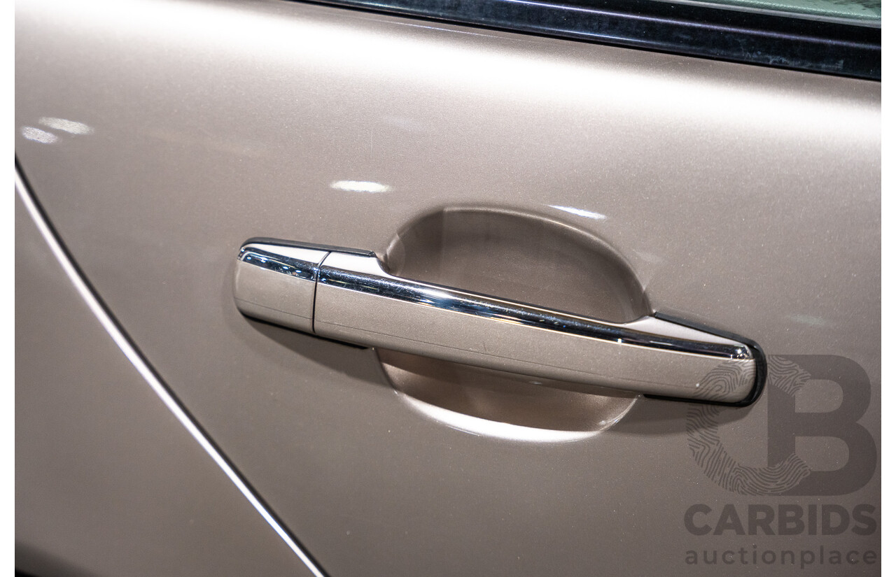 11/1999 Mercedes-Benz E240 Elegance W210 4d Sedan Travertine Beige Metallic 2.4L