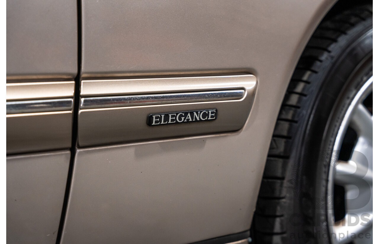 11/1999 Mercedes-Benz E240 Elegance W210 4d Sedan Travertine Beige Metallic 2.4L