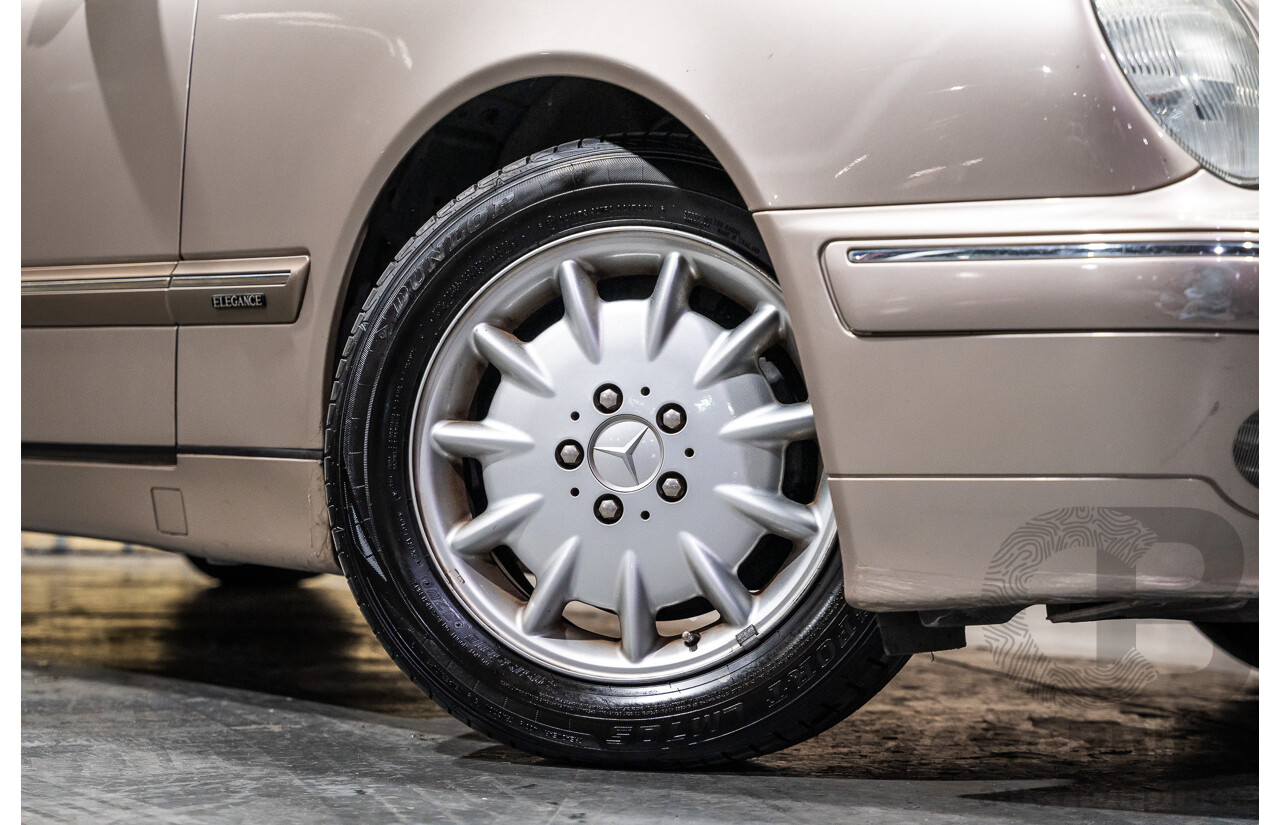 11/1999 Mercedes-Benz E240 Elegance W210 4d Sedan Travertine Beige Metallic 2.4L