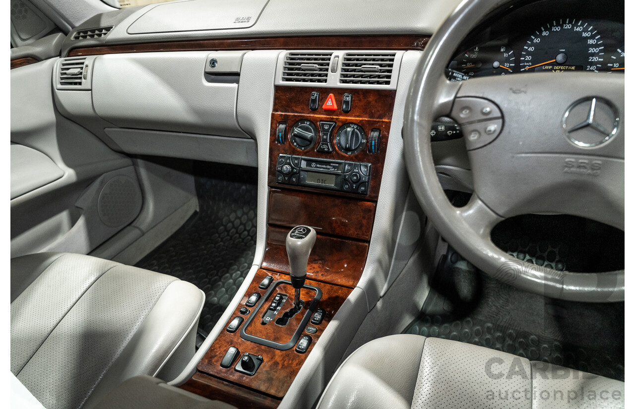 11/1999 Mercedes-Benz E240 Elegance W210 4d Sedan Travertine Beige Metallic 2.4L