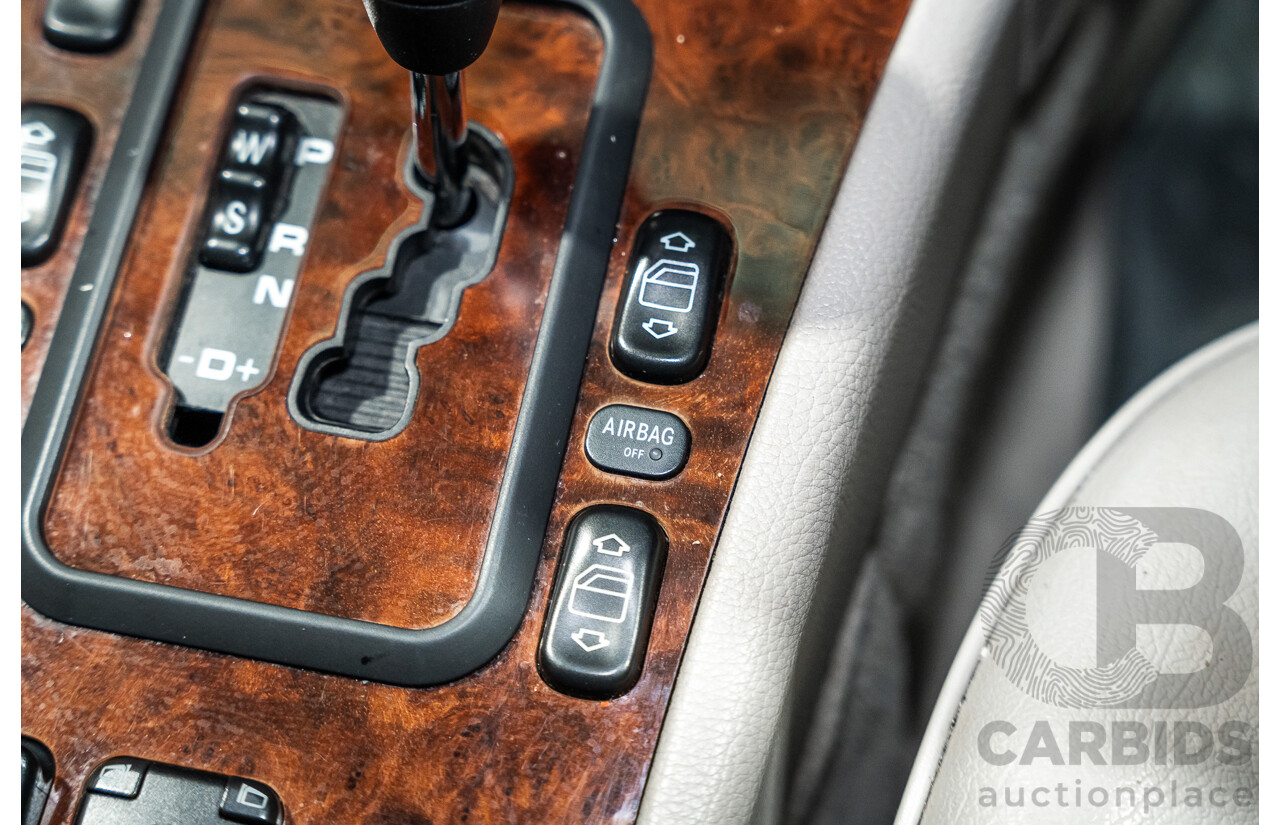 11/1999 Mercedes-Benz E240 Elegance W210 4d Sedan Travertine Beige Metallic 2.4L