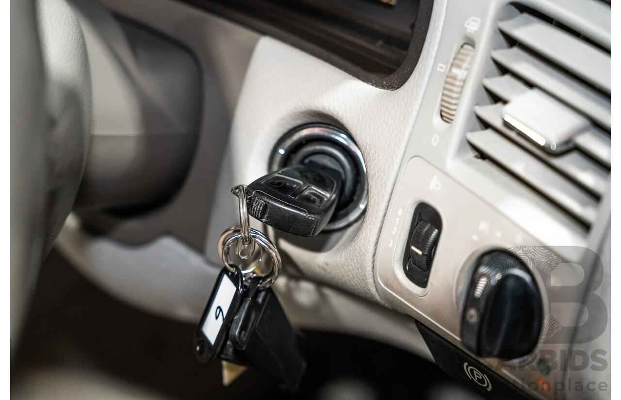 11/1999 Mercedes-Benz E240 Elegance W210 4d Sedan Travertine Beige Metallic 2.4L