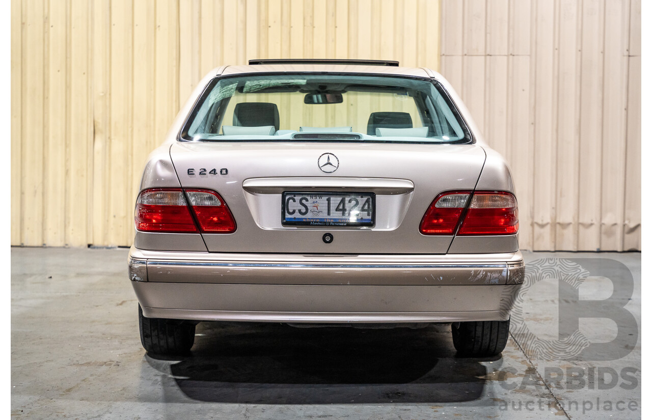 11/1999 Mercedes-Benz E240 Elegance W210 4d Sedan Travertine Beige Metallic 2.4L