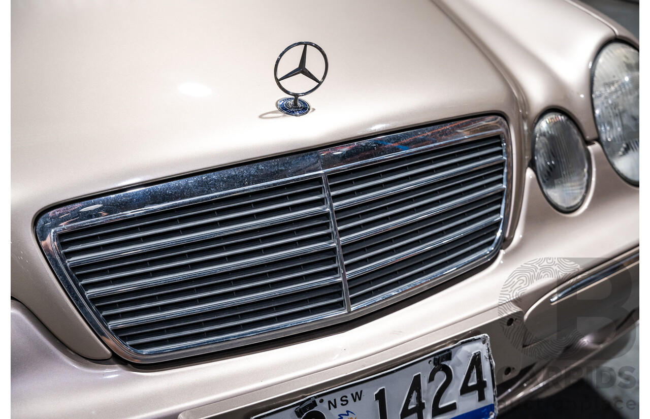 11/1999 Mercedes-Benz E240 Elegance W210 4d Sedan Travertine Beige Metallic 2.4L