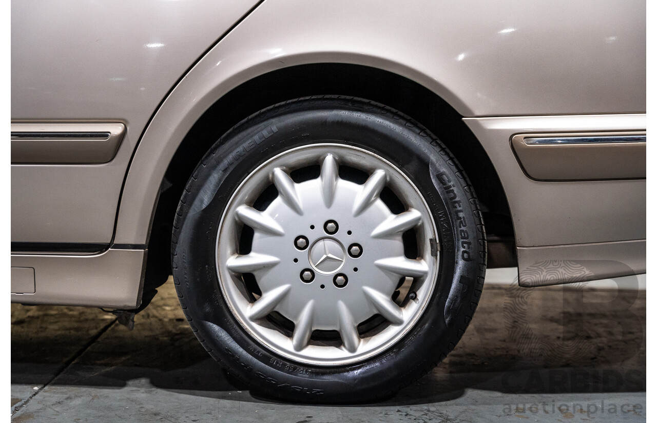 11/1999 Mercedes-Benz E240 Elegance W210 4d Sedan Travertine Beige Metallic 2.4L