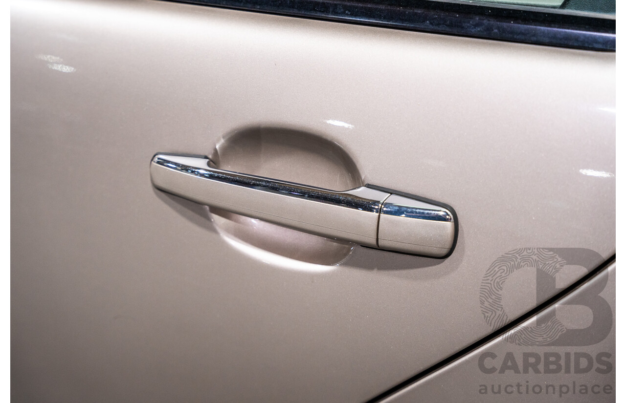 11/1999 Mercedes-Benz E240 Elegance W210 4d Sedan Travertine Beige Metallic 2.4L