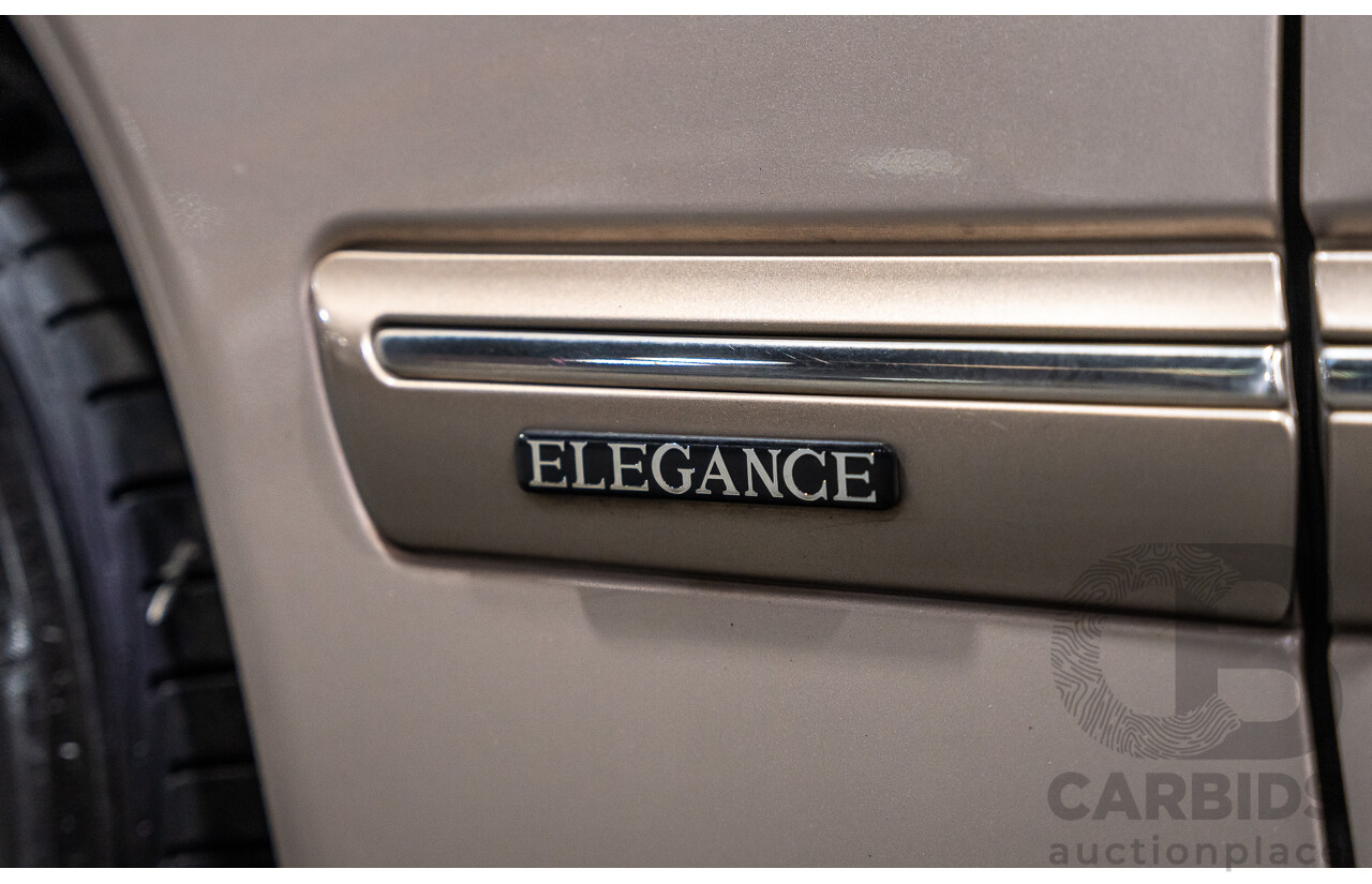 11/1999 Mercedes-Benz E240 Elegance W210 4d Sedan Travertine Beige Metallic 2.4L