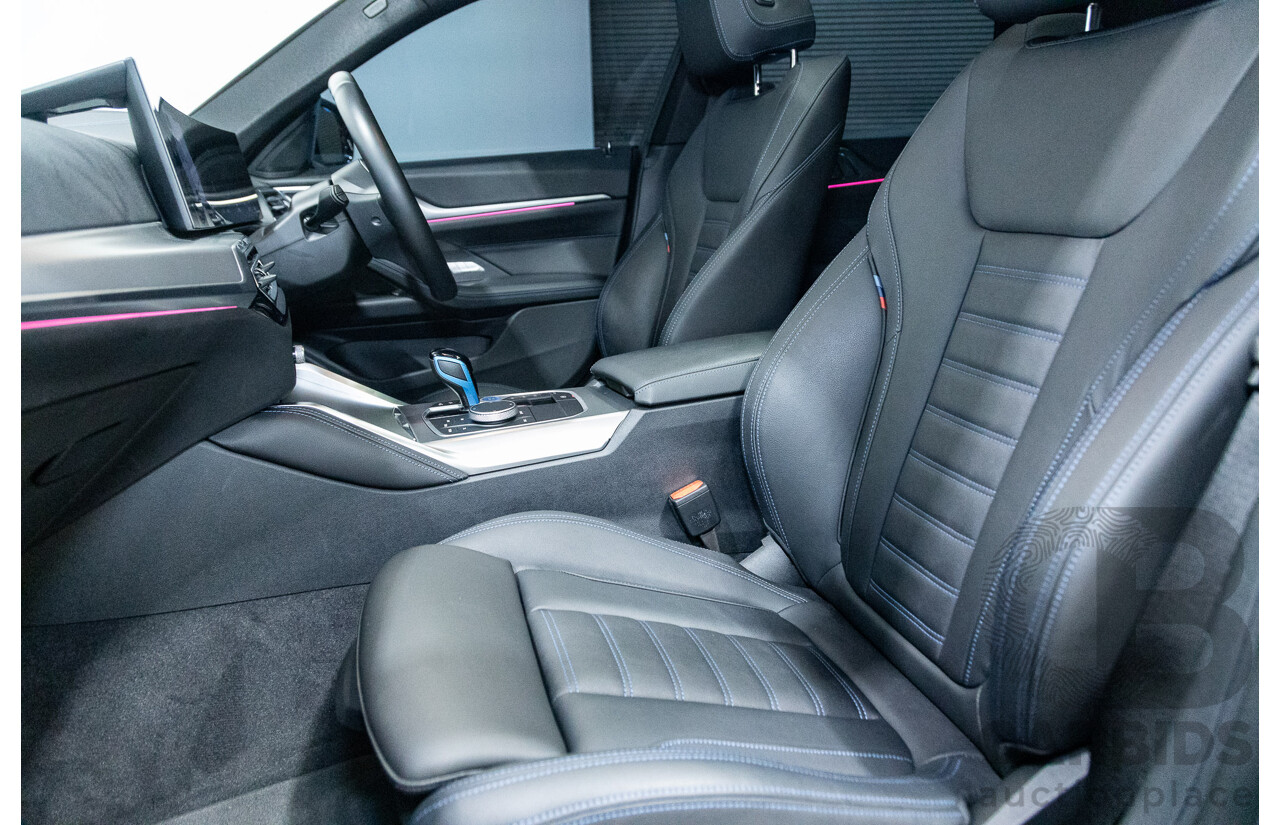 05/2022 BMW i4 eDrive40i M-Sport Gran Coupe G26 4D Coupe Black Sapphire Metallic Electric EV 250kw