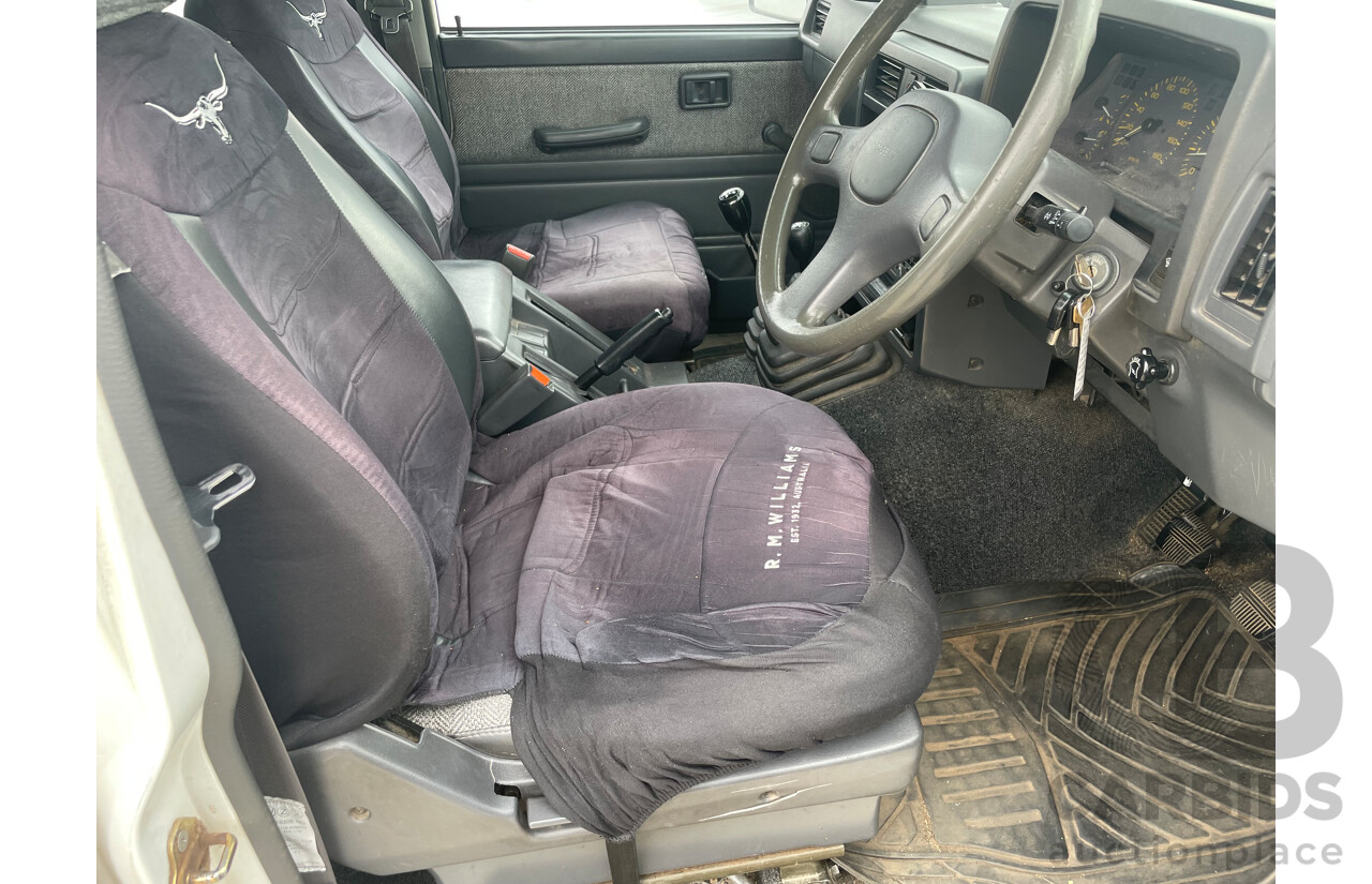 8/1991 Nissan Patrol ST30 (4x4) GQ 4d Wagon White 3.0L