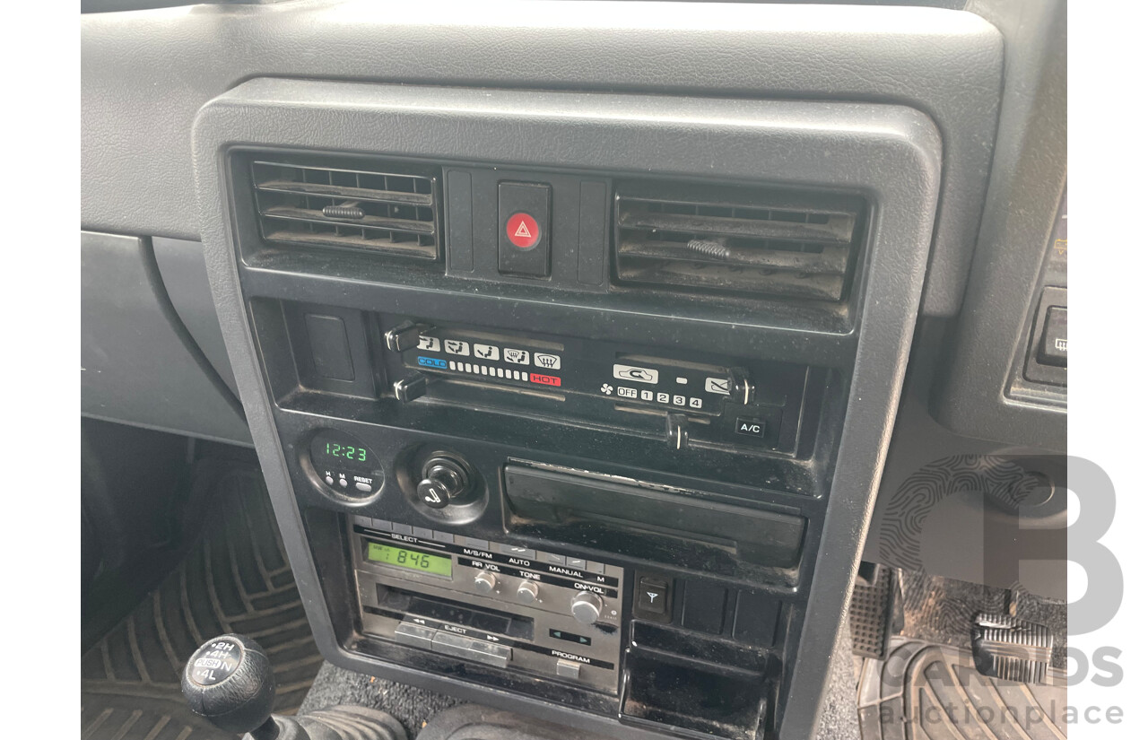 8/1991 Nissan Patrol ST30 (4x4) GQ 4d Wagon White 3.0L