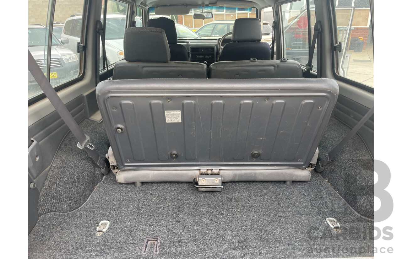 8/1991 Nissan Patrol ST30 (4x4) GQ 4d Wagon White 3.0L