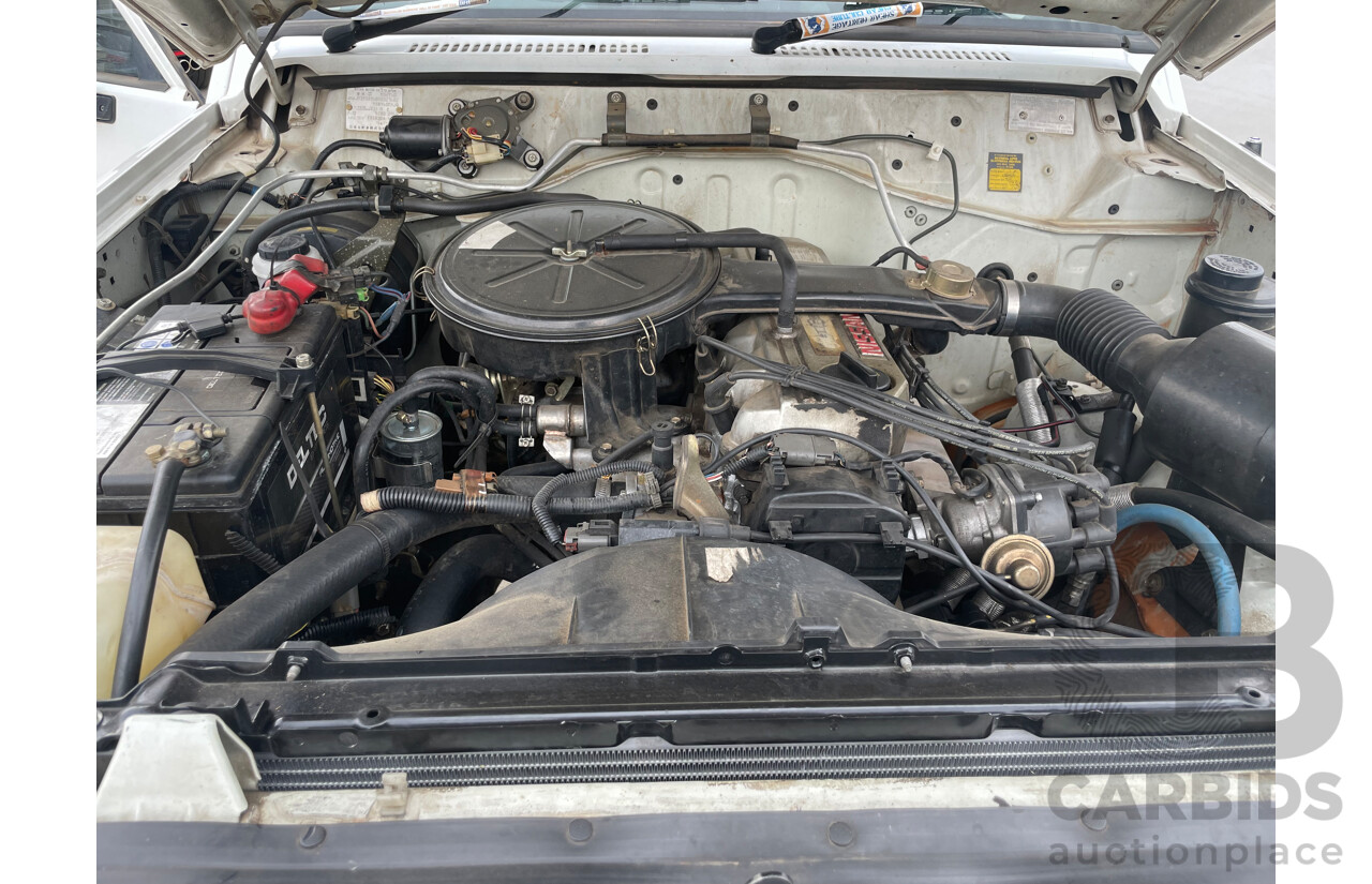 8/1991 Nissan Patrol ST30 (4x4) GQ 4d Wagon White 3.0L
