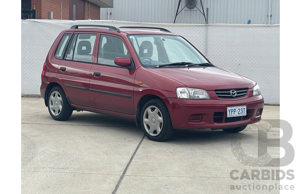 3/2000 Mazda 121 Metro  5d Hatchback Maroon 1.3L