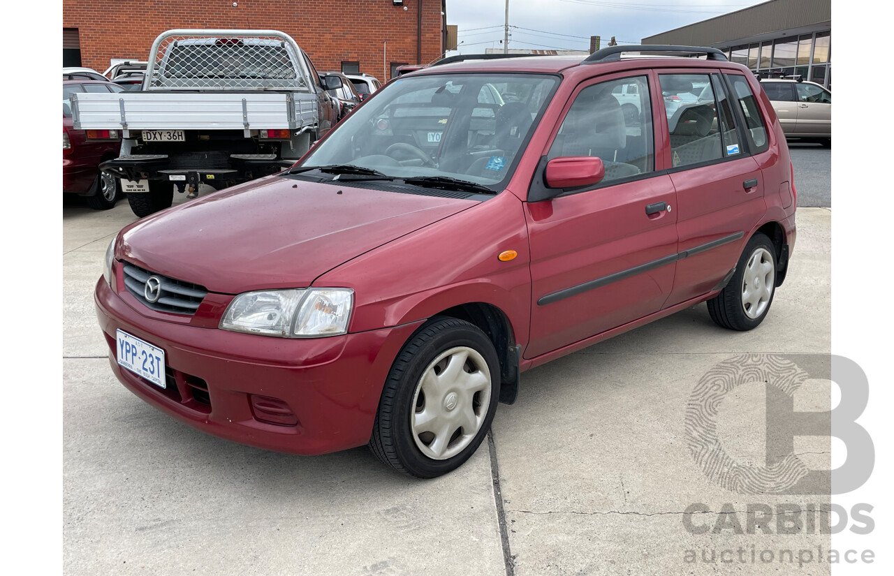 3/2000 Mazda 121 Metro  5d Hatchback Maroon 1.3L