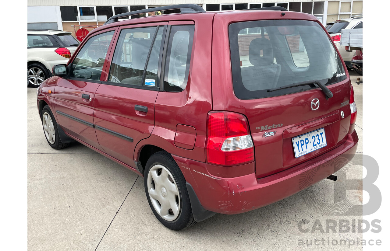 3/2000 Mazda 121 Metro  5d Hatchback Maroon 1.3L