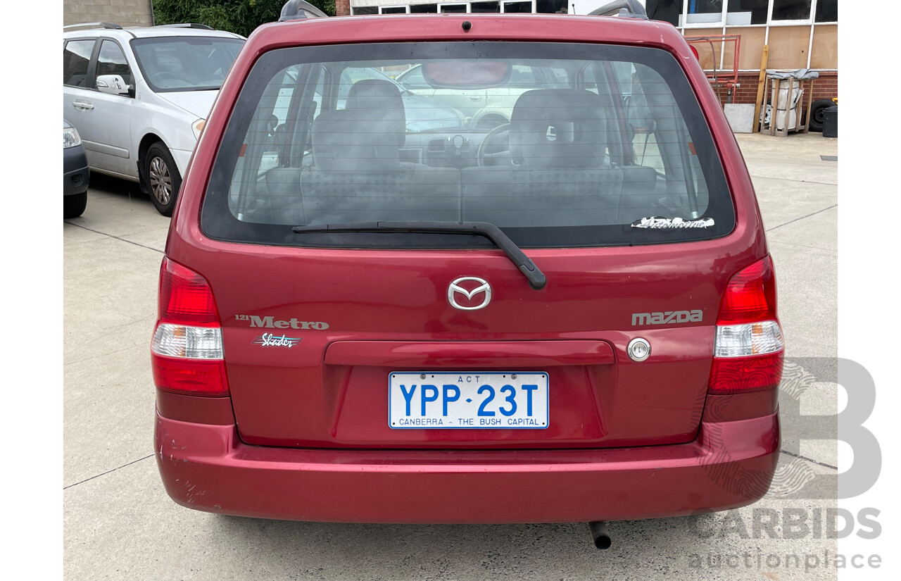 3/2000 Mazda 121 Metro  5d Hatchback Maroon 1.3L
