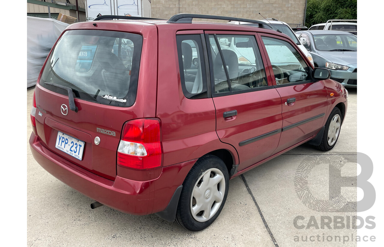 3/2000 Mazda 121 Metro  5d Hatchback Maroon 1.3L