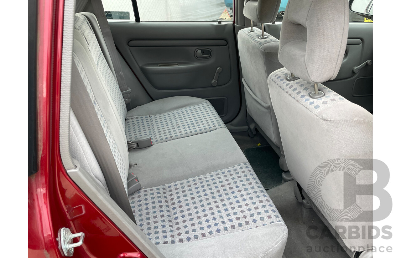 3/2000 Mazda 121 Metro  5d Hatchback Maroon 1.3L