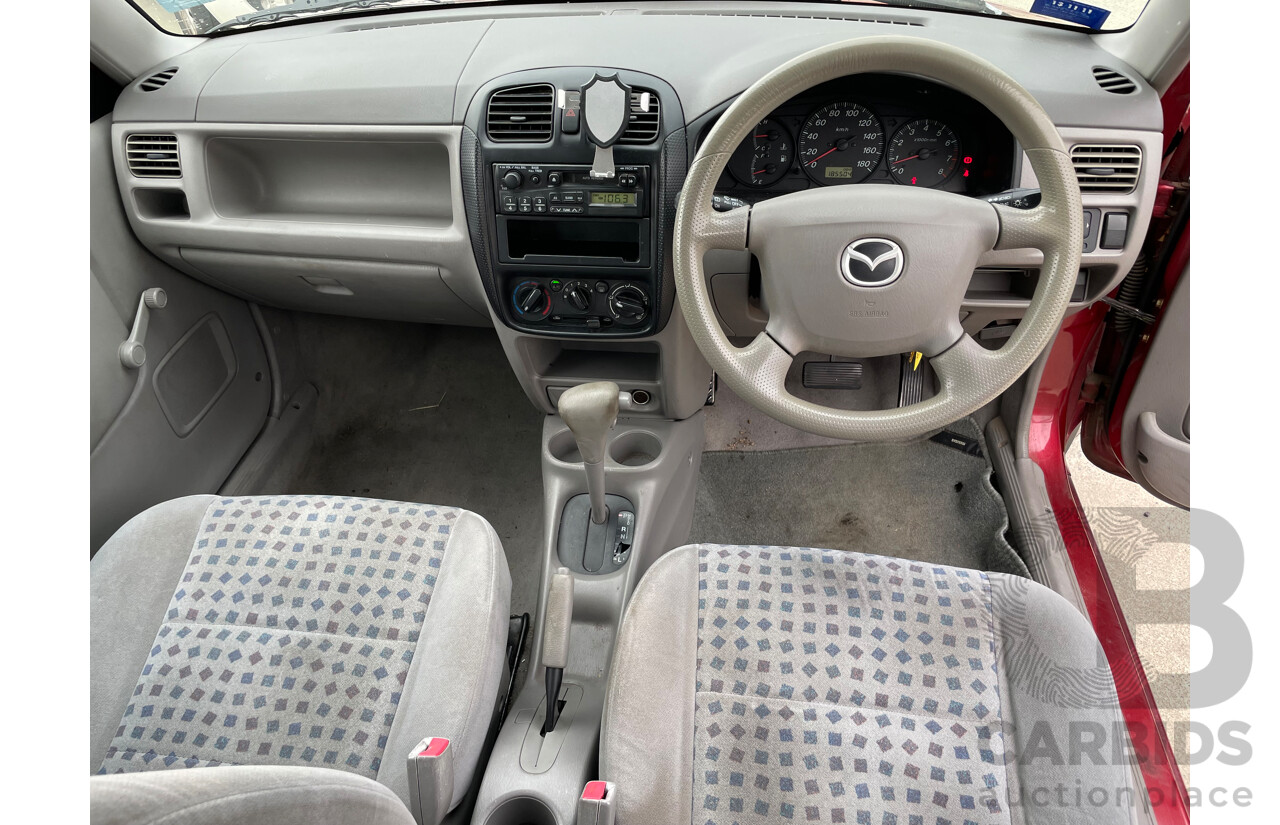 3/2000 Mazda 121 Metro  5d Hatchback Maroon 1.3L