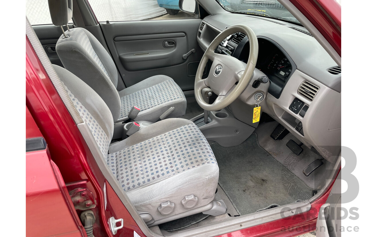 3/2000 Mazda 121 Metro  5d Hatchback Maroon 1.3L