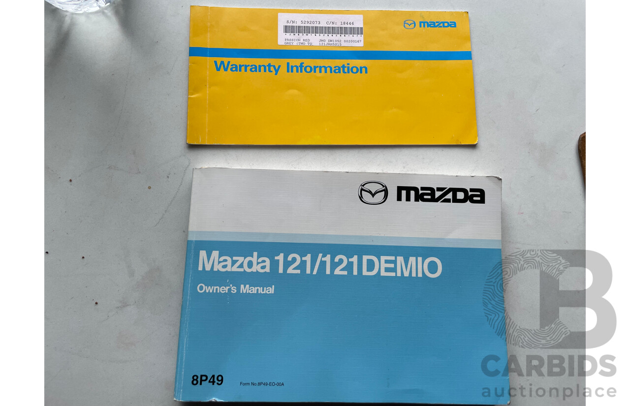 3/2000 Mazda 121 Metro  5d Hatchback Maroon 1.3L