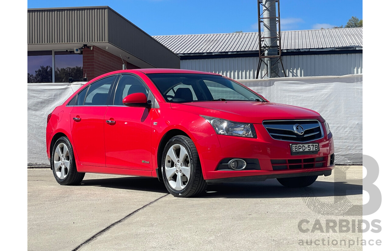 05/10 Holden Cruze CDX FWD JG 4D Sedan Red 2.0L