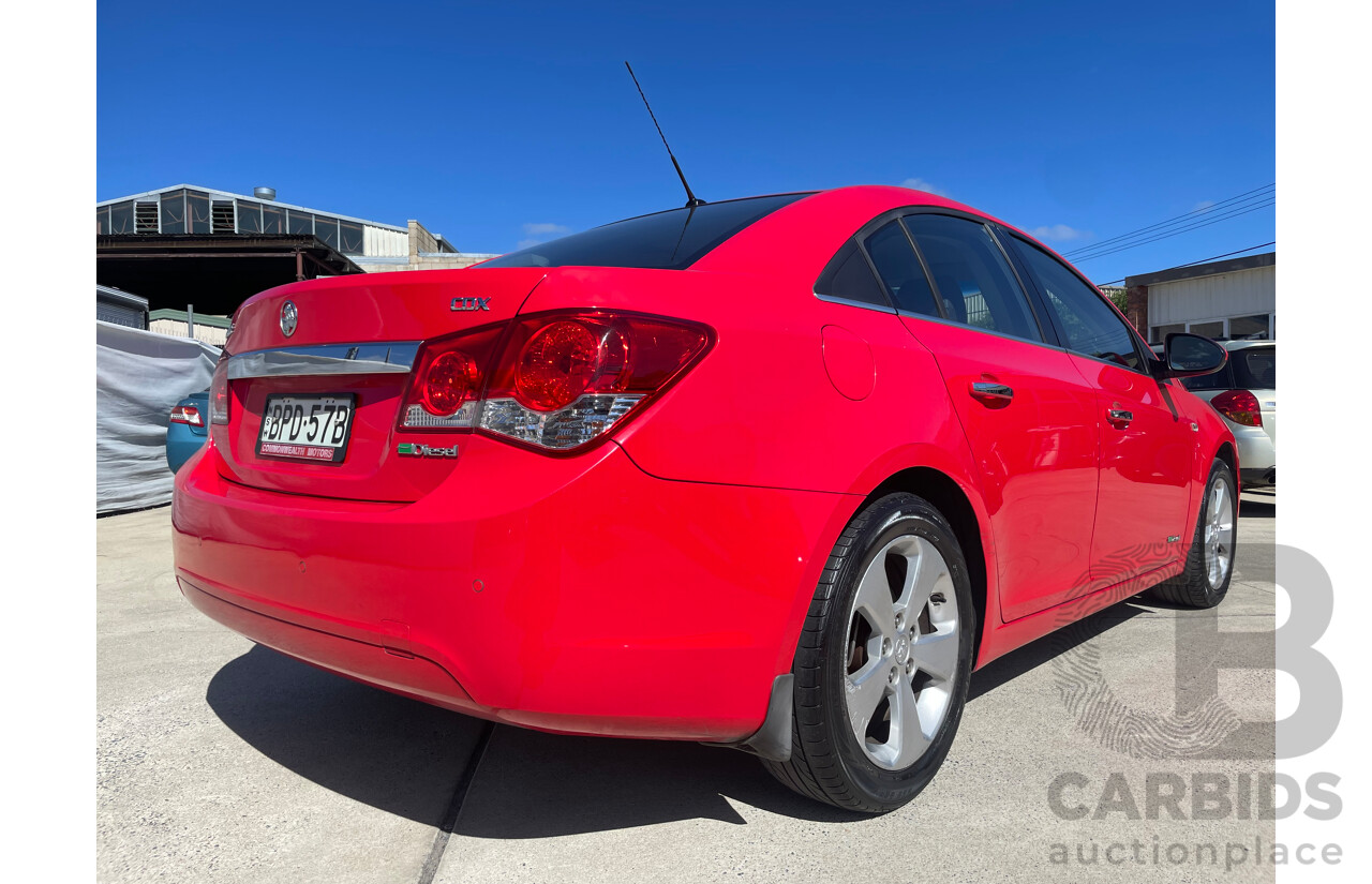 05/10 Holden Cruze CDX FWD JG 4D Sedan Red 2.0L