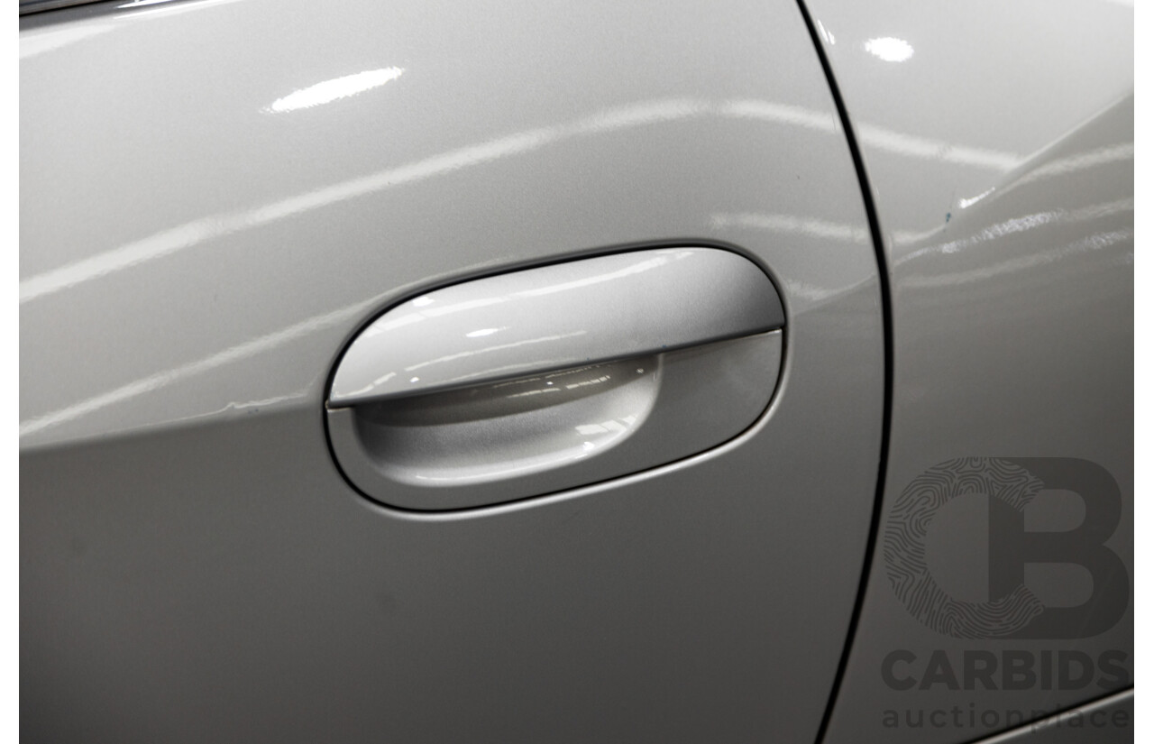 07/2003 BMW Z4 3.0i E85 2D Roadster Titan Silver Metallic 3.0L