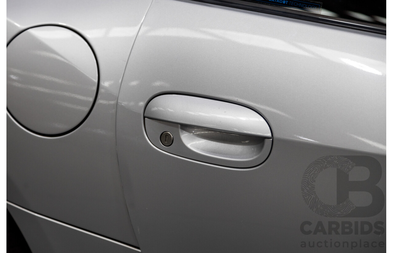 07/2003 BMW Z4 3.0i E85 2D Roadster Titan Silver Metallic 3.0L