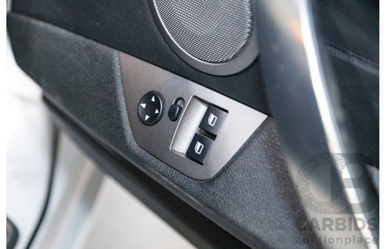 07/2003 BMW Z4 3.0i E85 2D Roadster Titan Silver Metallic 3.0L