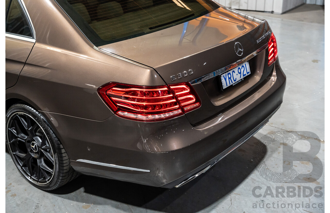9/2013 Mercedes Benz E300 Bluetec Hybrid 212 MY13 4d Sedan Dolomite Brown Metallic Turbo Diesel 2.1L - Hybrid