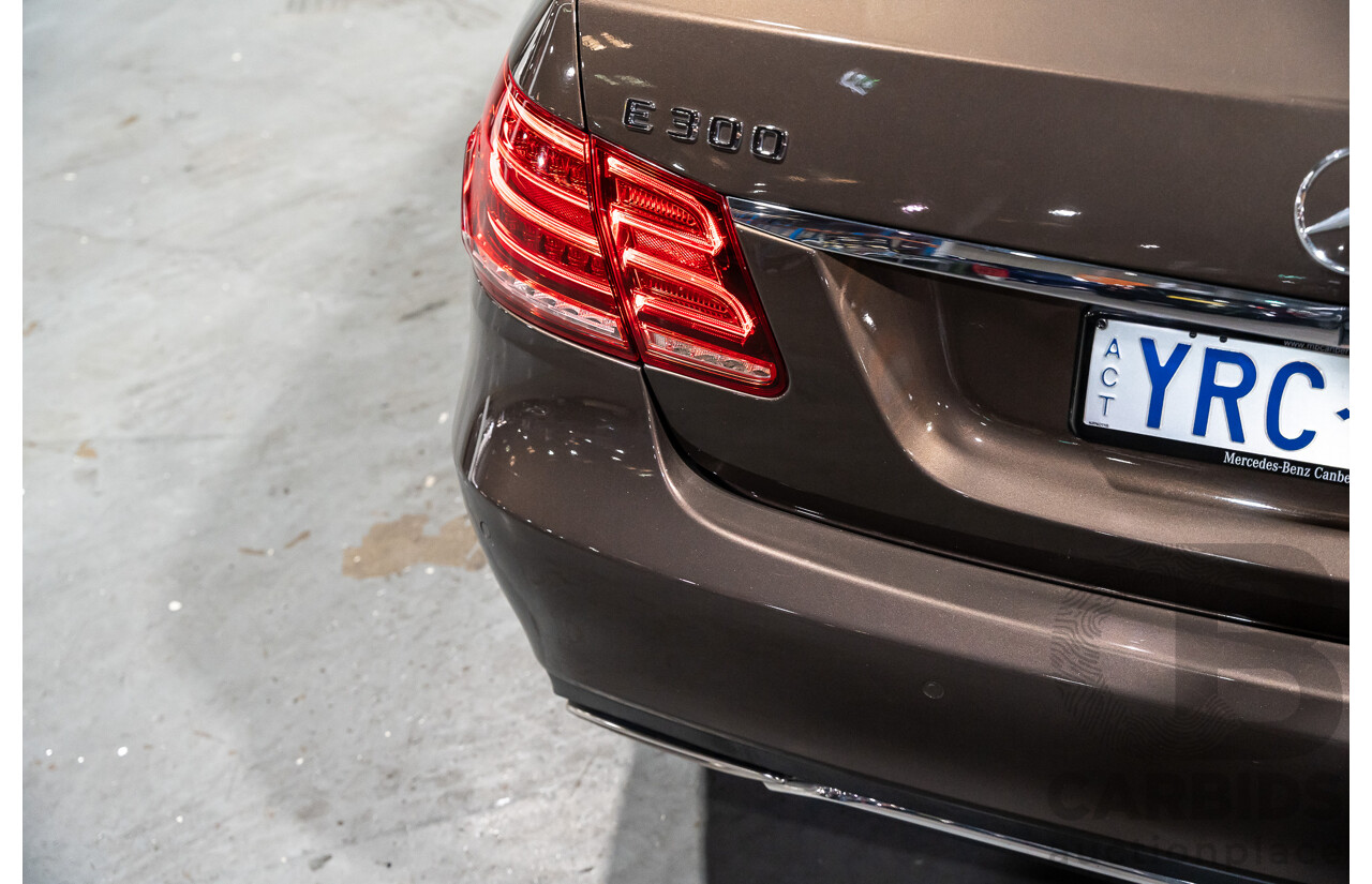 9/2013 Mercedes Benz E300 Bluetec Hybrid 212 MY13 4d Sedan Dolomite Brown Metallic Turbo Diesel 2.1L - Hybrid