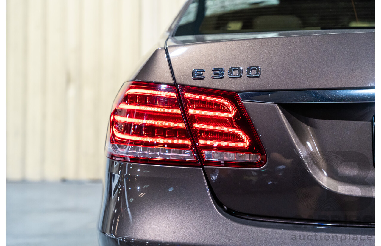 9/2013 Mercedes Benz E300 Bluetec Hybrid 212 MY13 4d Sedan Dolomite Brown Metallic Turbo Diesel 2.1L - Hybrid
